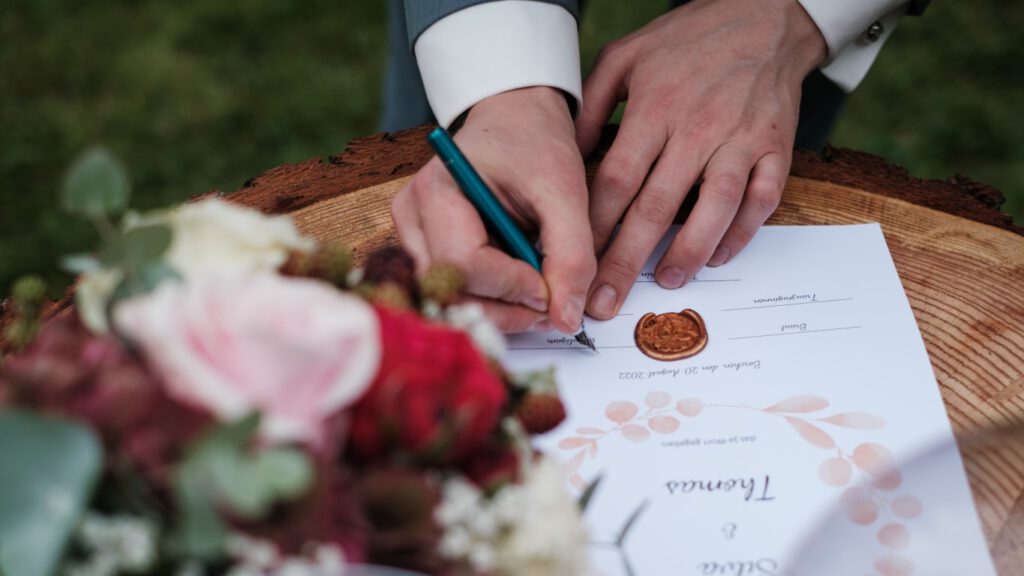 Hochzeitsfoto Unterschrift bei der freien Trauung